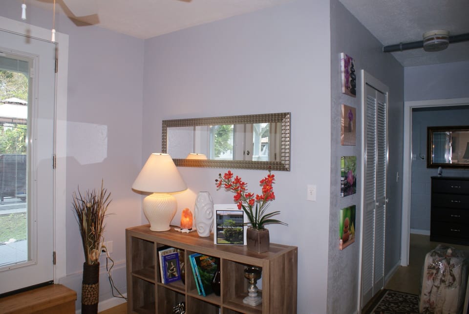 Downstairs: Hallway leading to bedrooms and bathroom.