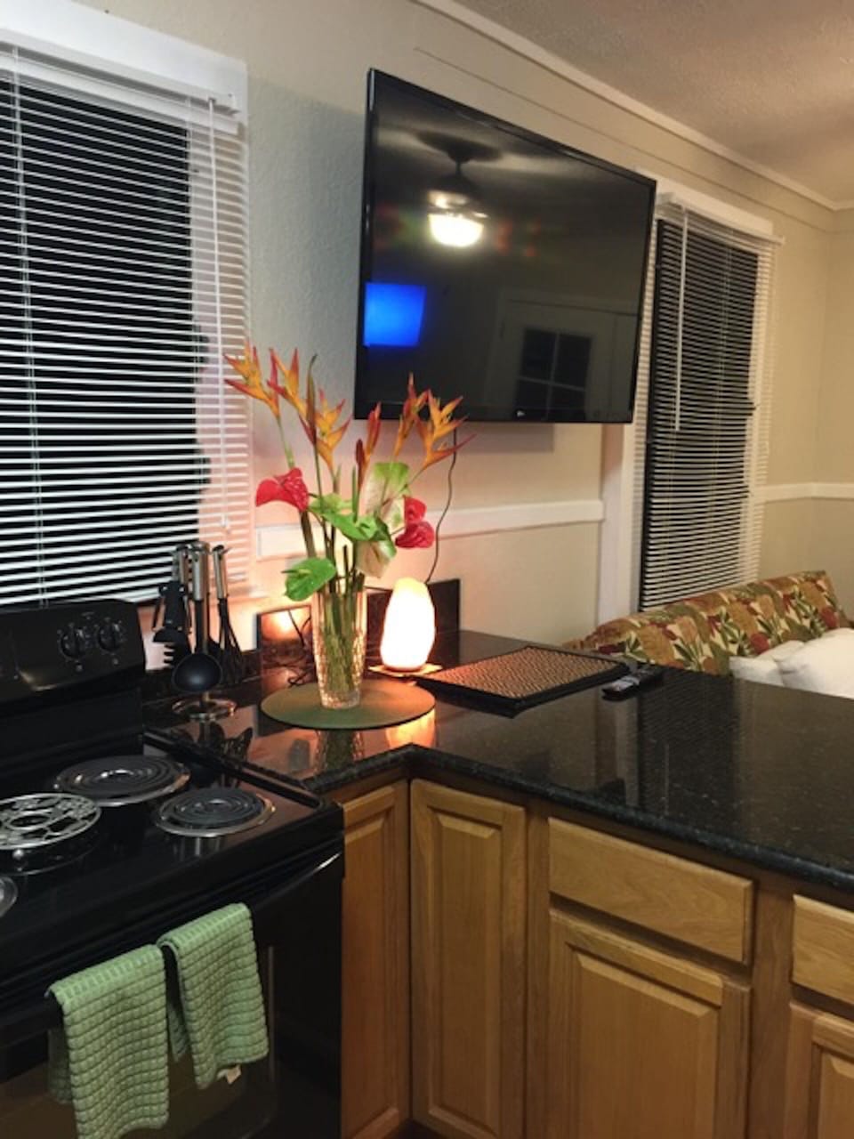 Kitchen with granite counter 
50 inch smart TV