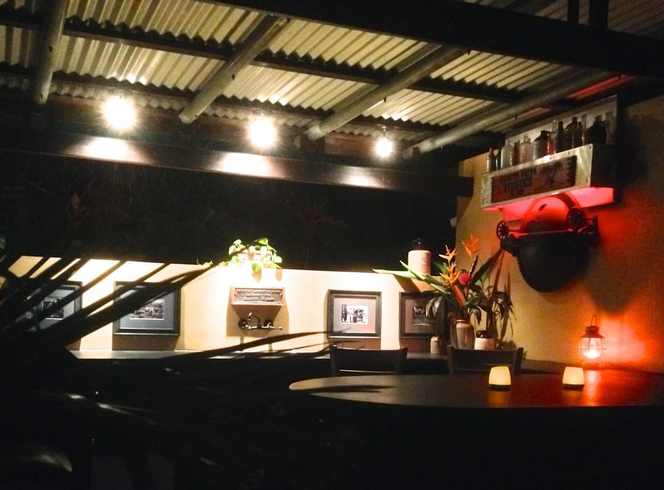 Antique bottle collection and mood lighting.