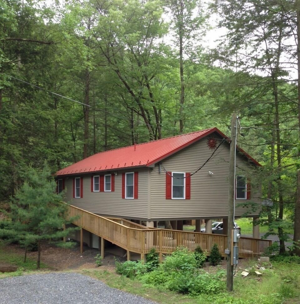 The cottage as seen from the road. The handicapped ramp is great for everyone!