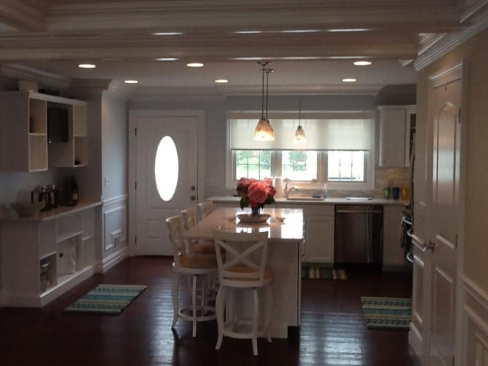 View of kitchen island with seating for 4-6 people