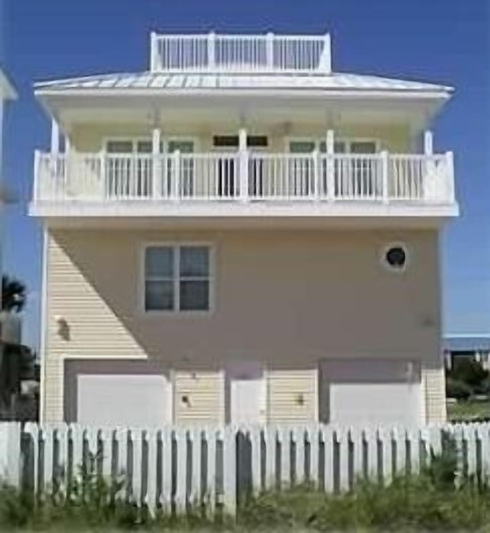 Frontal View Showing Deck Facing Gulf , the Top Deck & 4 Car Garage