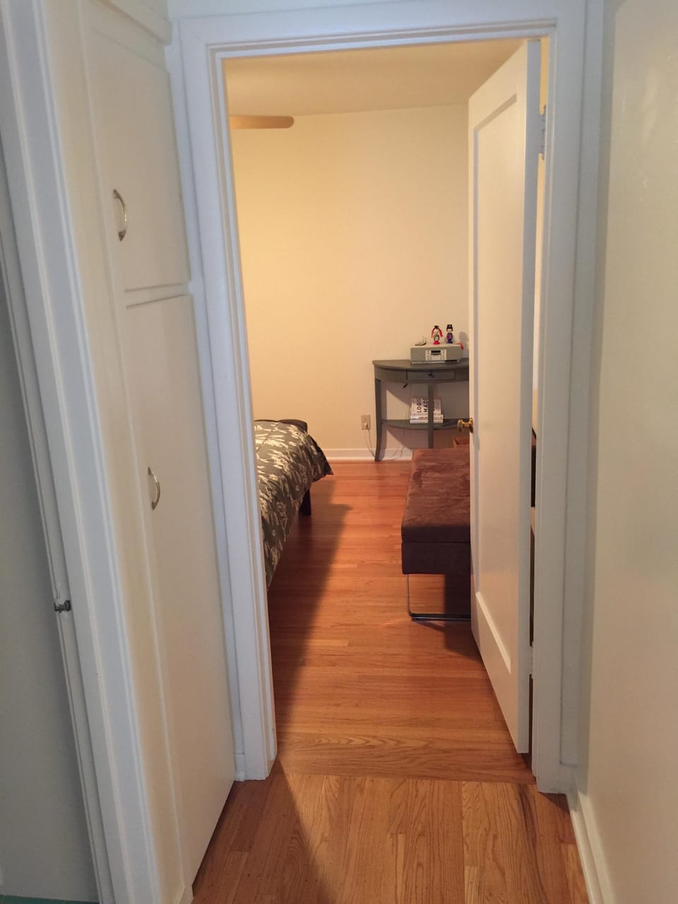 Hallway leading to bedrooms and bathroom.
