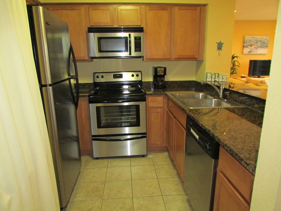 Beautiful kitchen with stainless steel appliances and granite counter tops