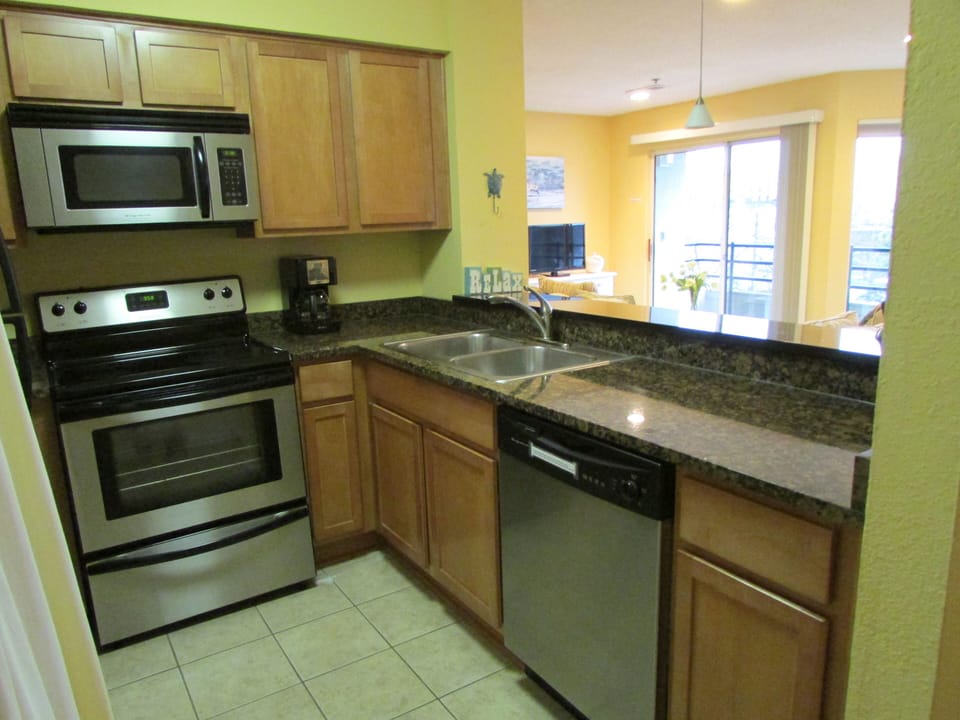 Kitchen, stove, microwave, dishwasher, full size refrigerator, granite tops