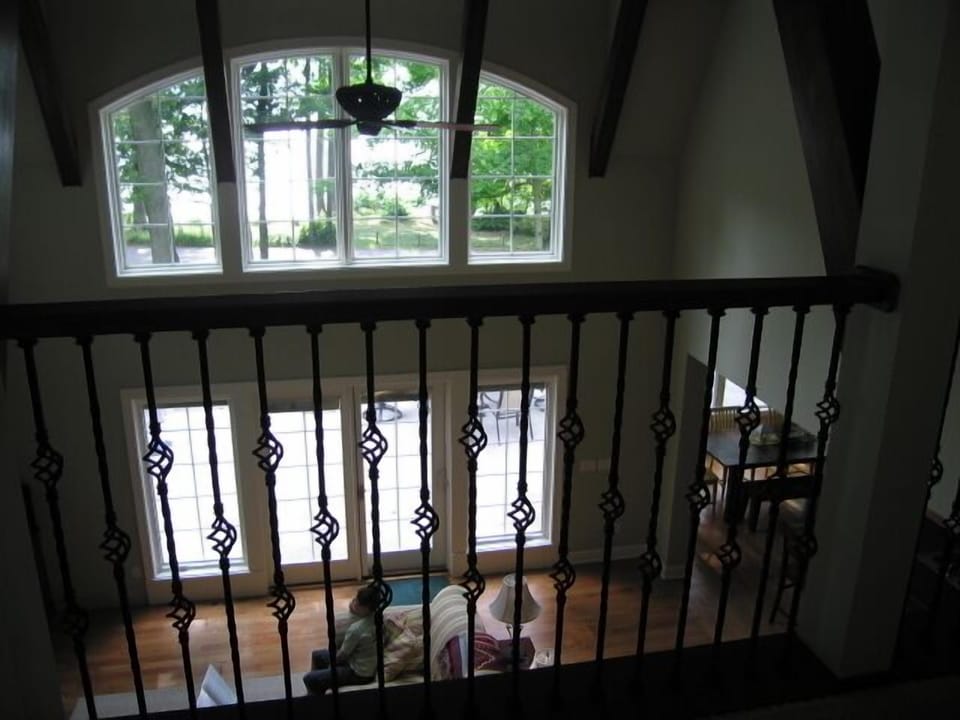 2nd floor balcony over looking Great Room and lake