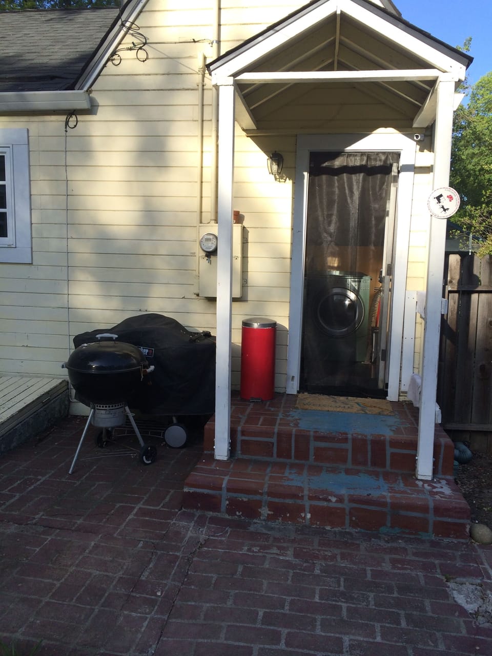 Backdoor entrance and grill area