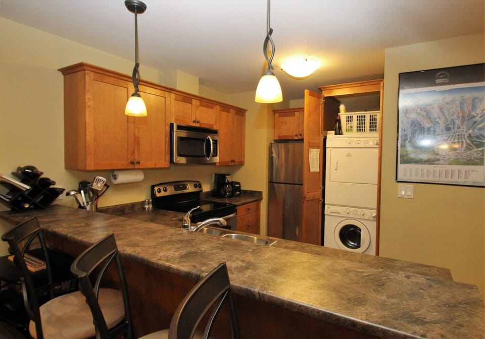 Breakfast bar in open concept kitchen.