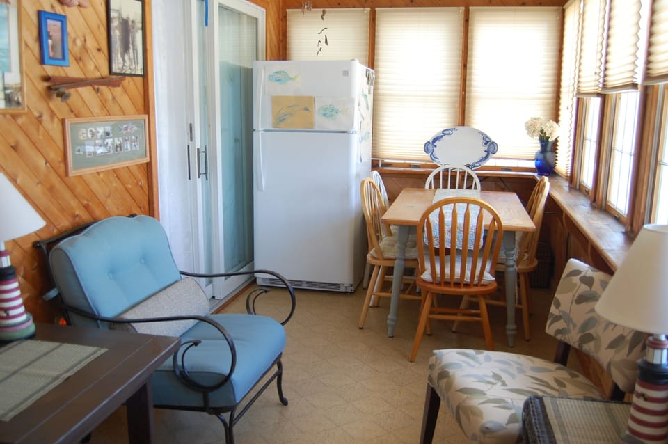 Sunporch with additional table and seating, and second refrigerator