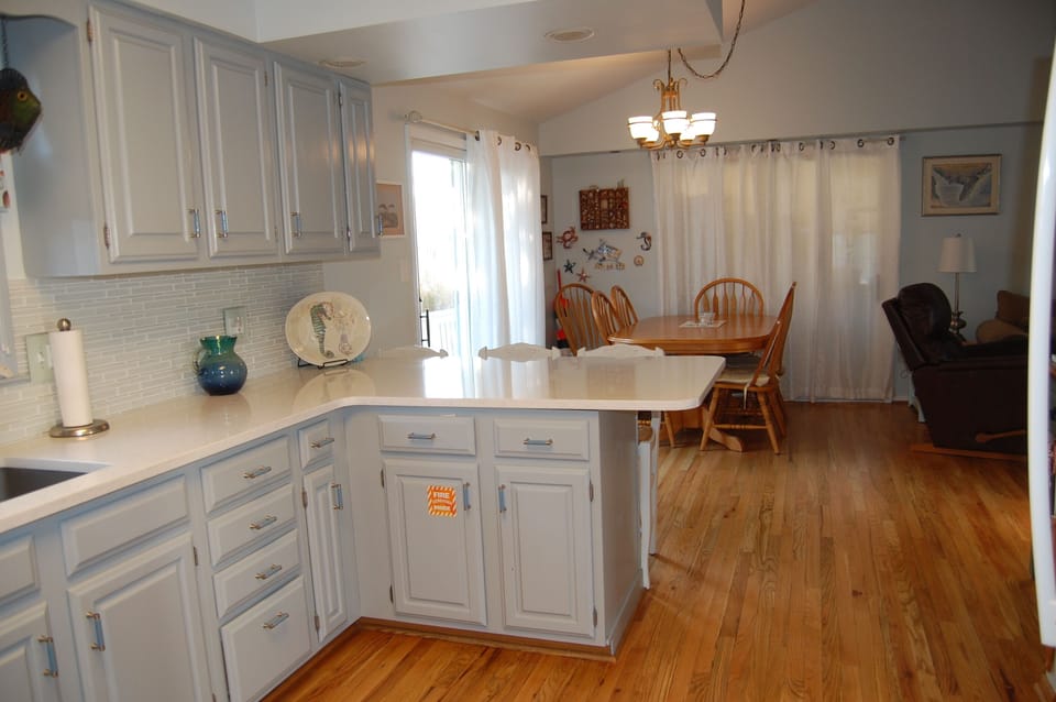 Large peninsula seats 4, Table opens to seat 10,  2nd fridge on porch-past table