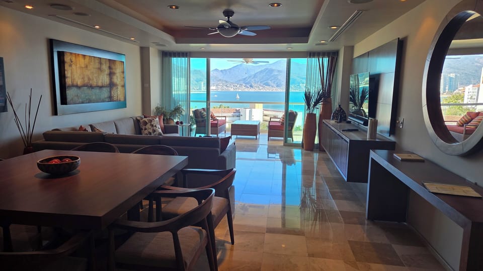 Beautifully decorated living area with sweeping views that inspire and soothe