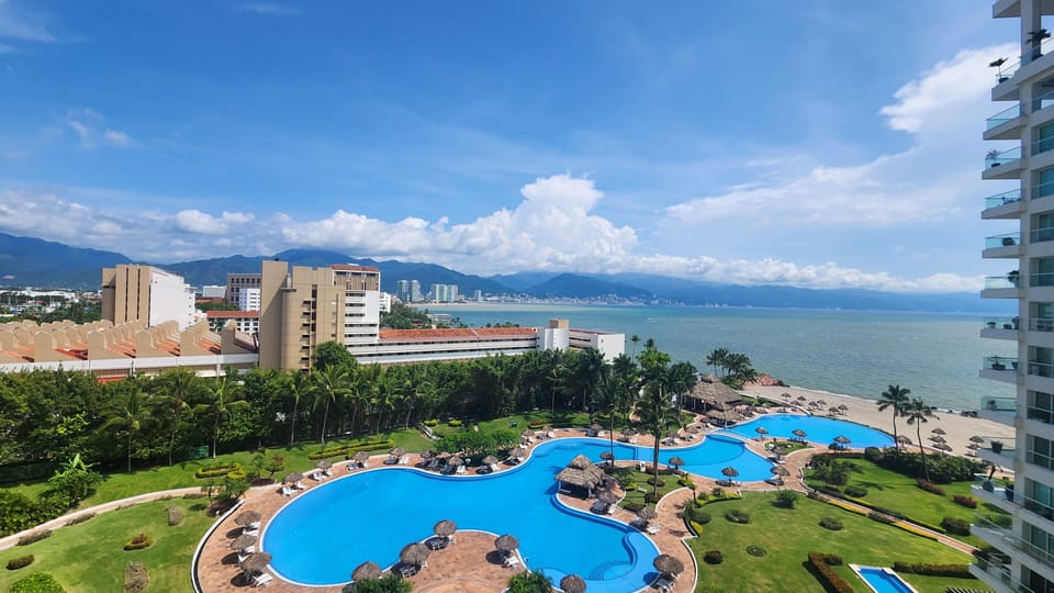 Your balcony view of the bay, city, and mountains from sunrise to sunset