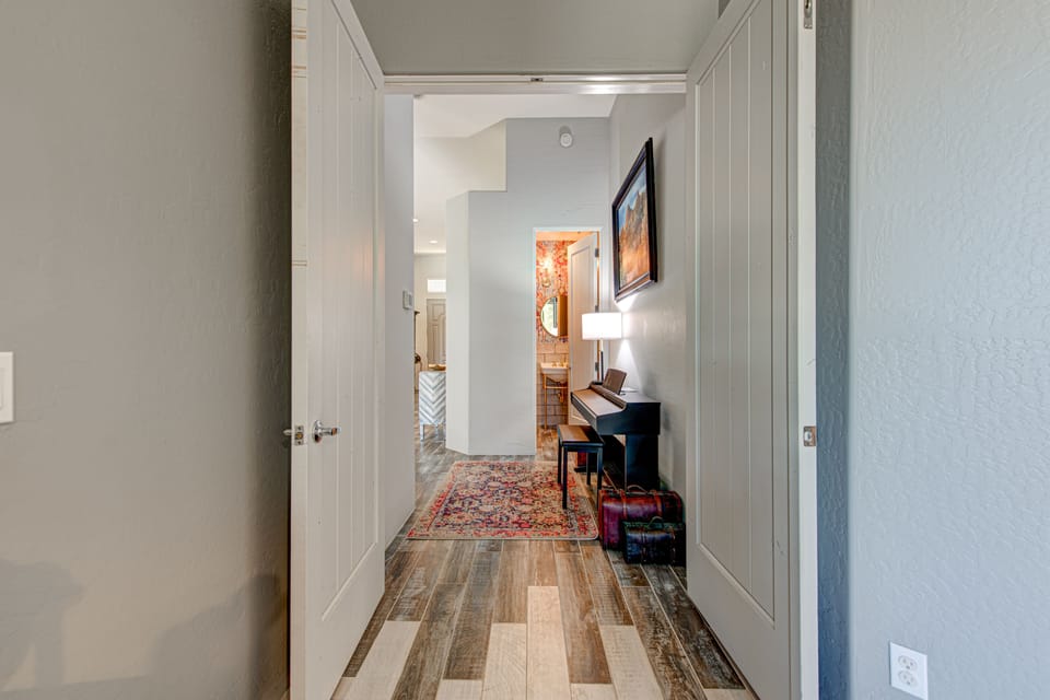 View through hallway to Guest Powder Room