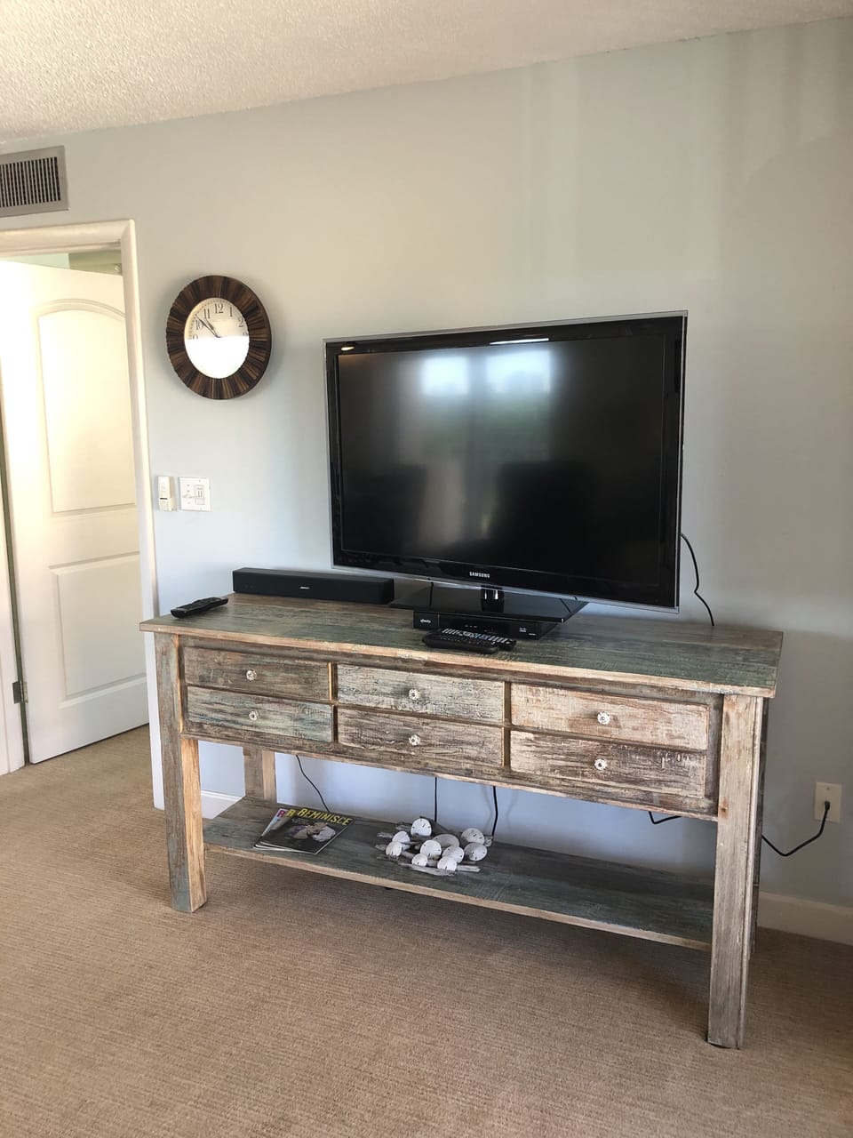 Large flat screen with Direct TV included.