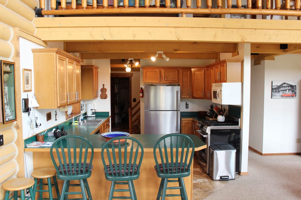 Kitchen area with bar seating