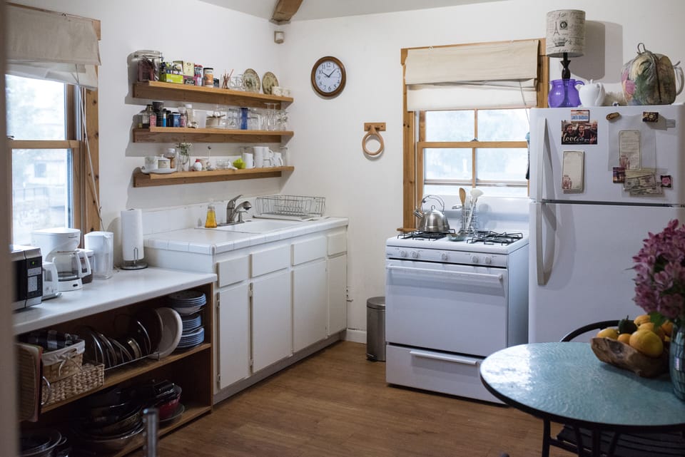 Gas stove and oven. Coffee maker. Toaster and microwave.