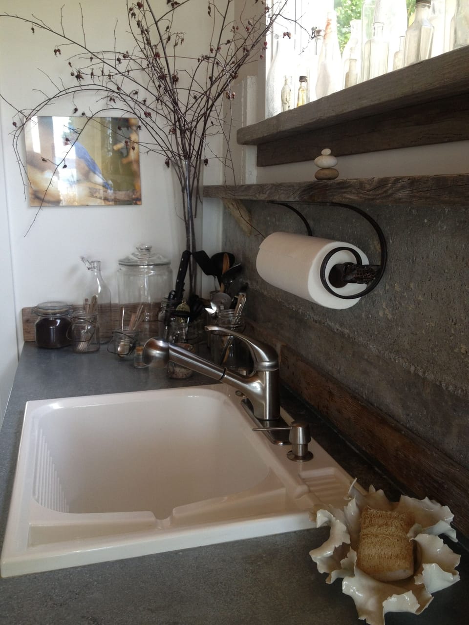 Sink, minifridge below counter.  