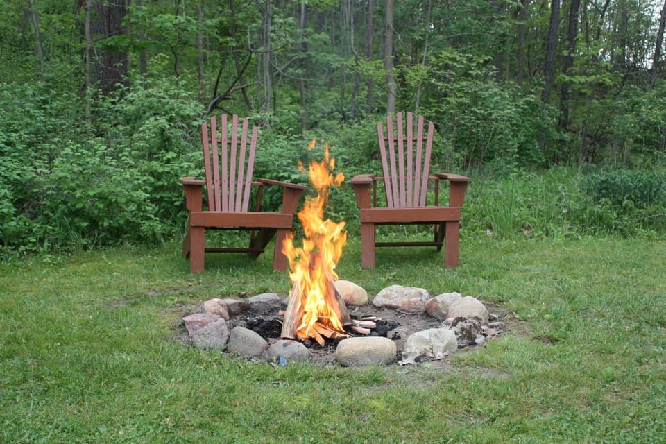 Enjoy a campfire.   We provide a lighter, kindling and newspaper. wood on site