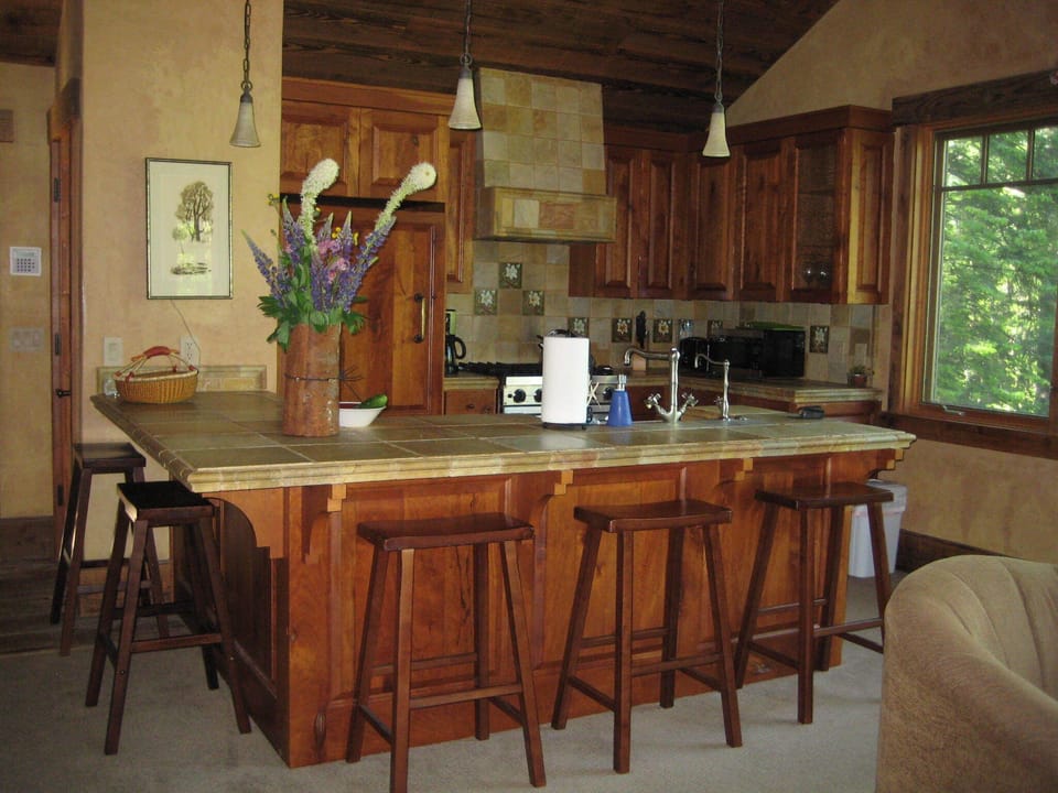 Very functional kitchen and sitting area.