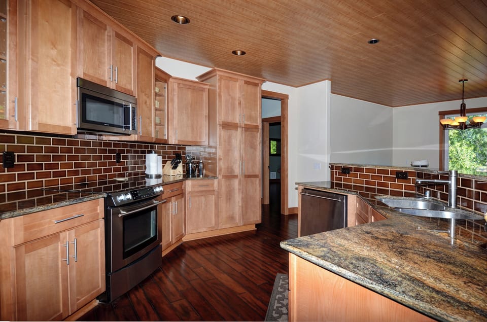 Open kitchen with granite countertops