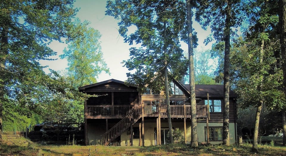 back of the cabin from the river