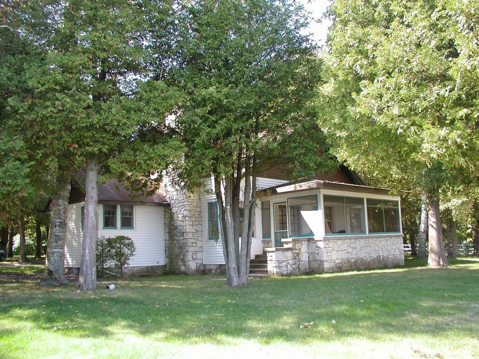 Looking at the Shorecrest house and screened porch from the water.