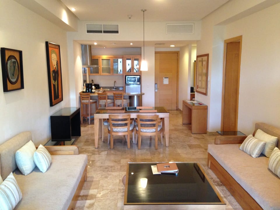 Grand Mayan Living Room, Dining & Kitchen Areas; Bedrooms on either side.
