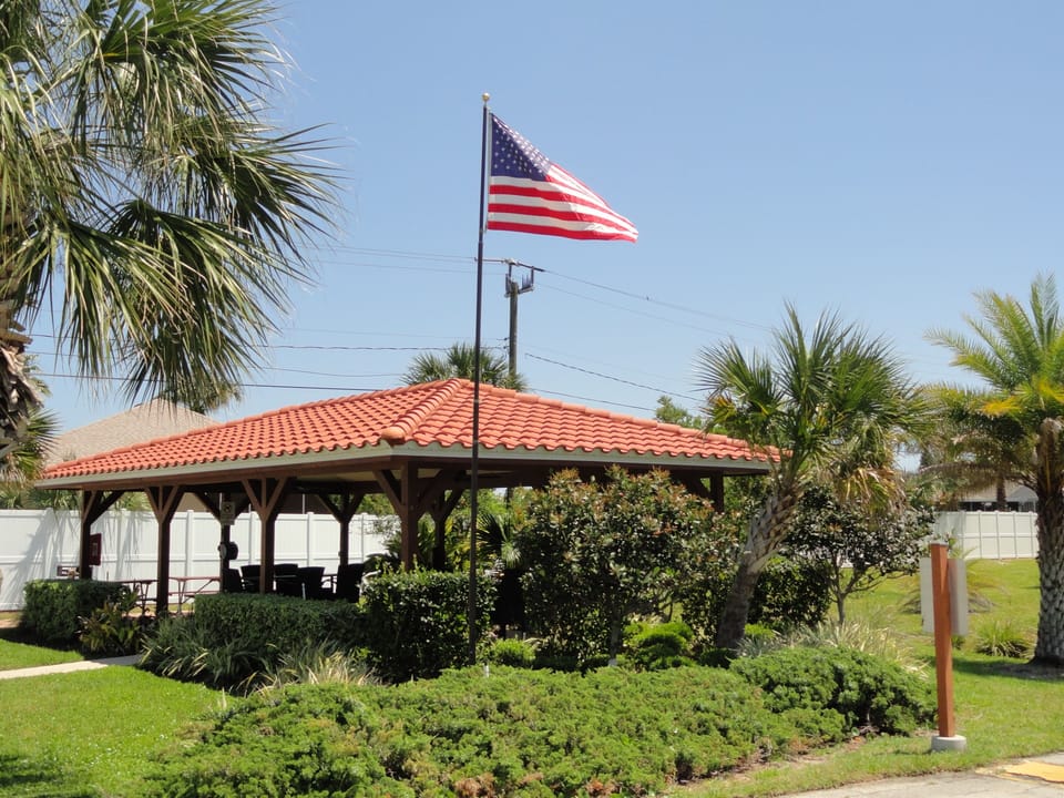 Barbeque area with grills and plenty of seating.