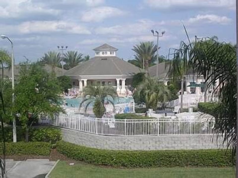 Clubhouse/communityt pool view from parking lot