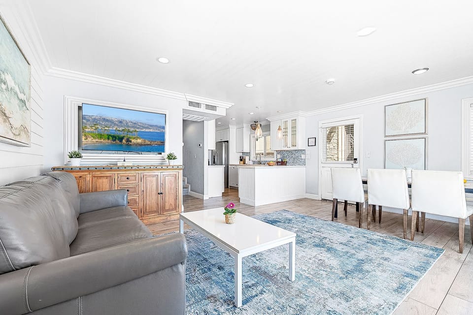 The kitchen looks out onto the dining area, making meal prep a social affair!
                