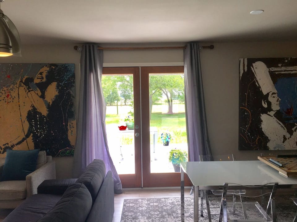 Artwork  and back yard before fireplace installed