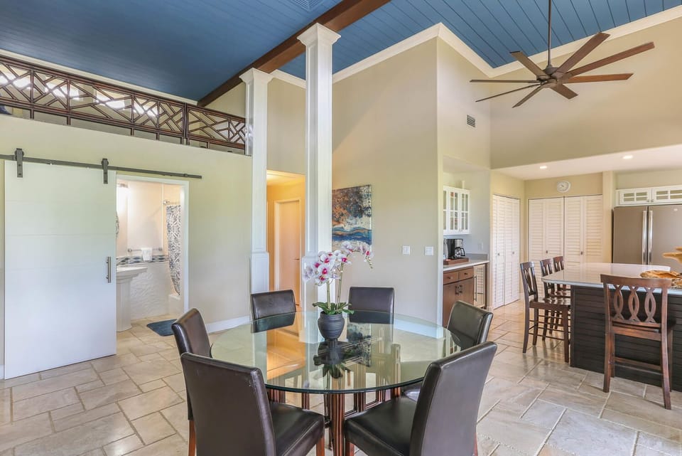 The round dining table offers a welcoming space for meals and conversation.