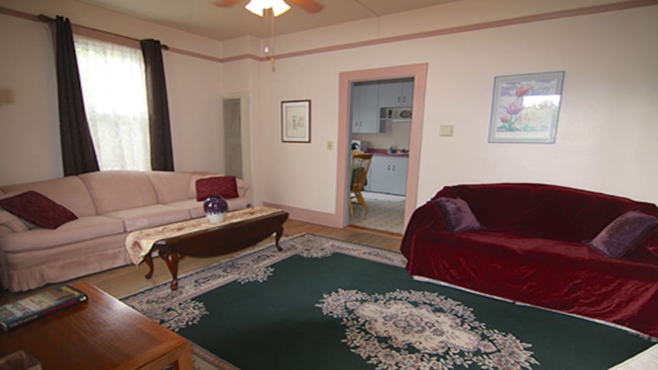 Living Room with TV and Roku player for your use.