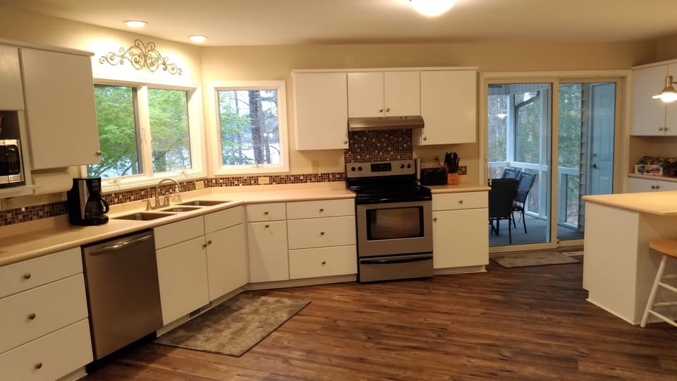 Bright and sunny kitchen-new appliances- fully stocked with all you need to cook