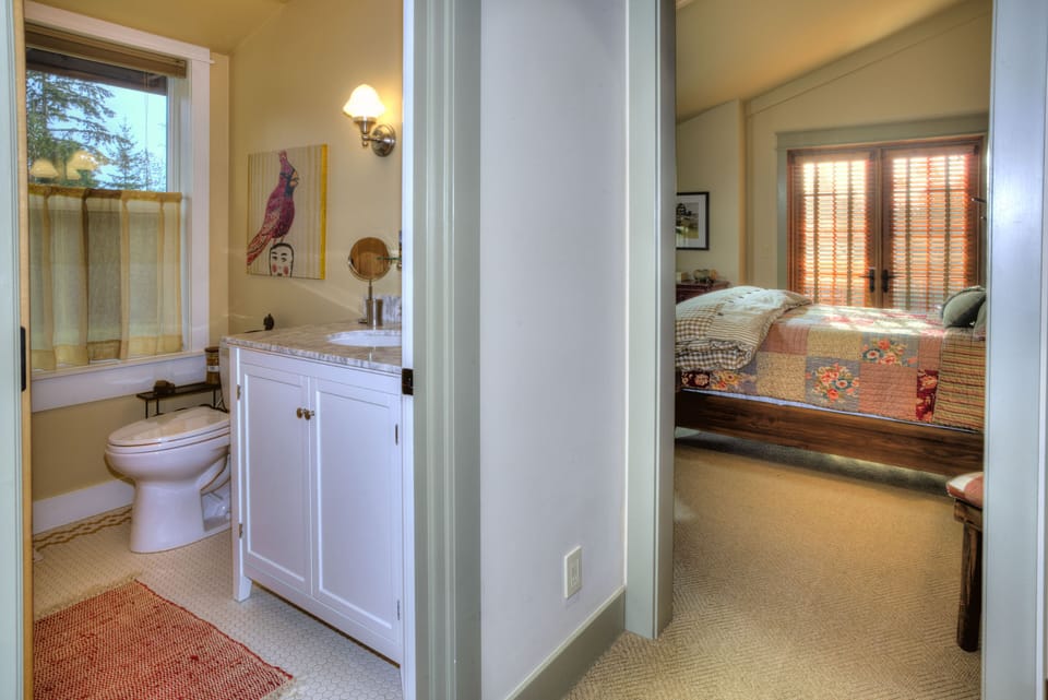 Attached bathroom with full bath and shower.  