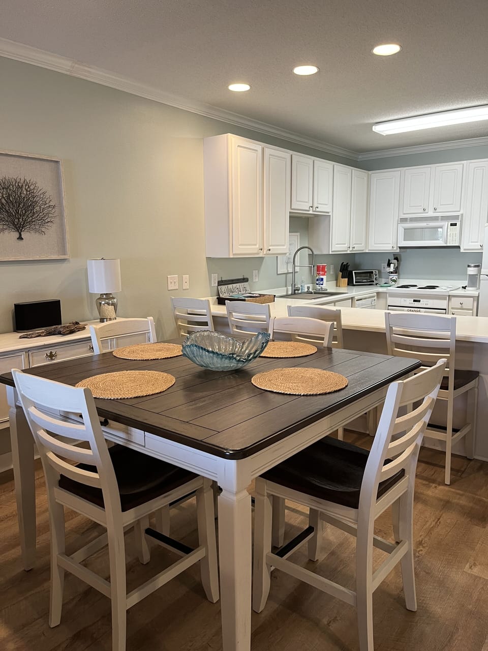 Dining area with bar and high table and chairs 