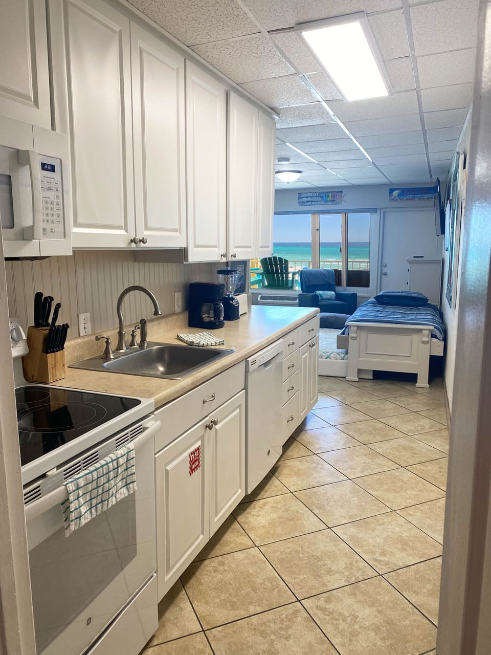 New Kitchen with dishwasher, microwave, oven, toaster, blender and coffee maker