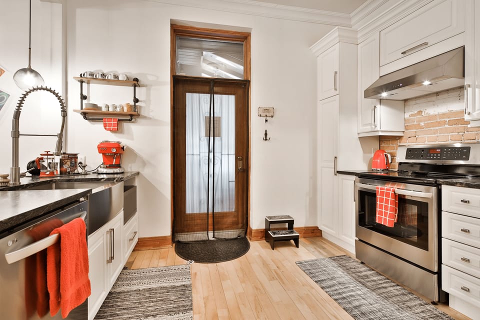 Backdoor entrance where you'll be arriving. Keys to front hanging on wall.