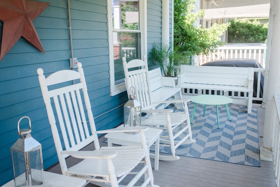 Large expansive front porch with ample seating greet you upon arrival!