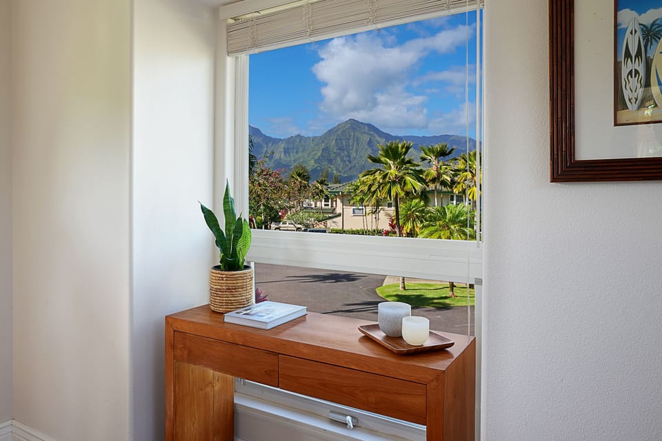 Wake up to breathtaking mountain views from the guest bedroom, the perfect way to start your day in paradise.