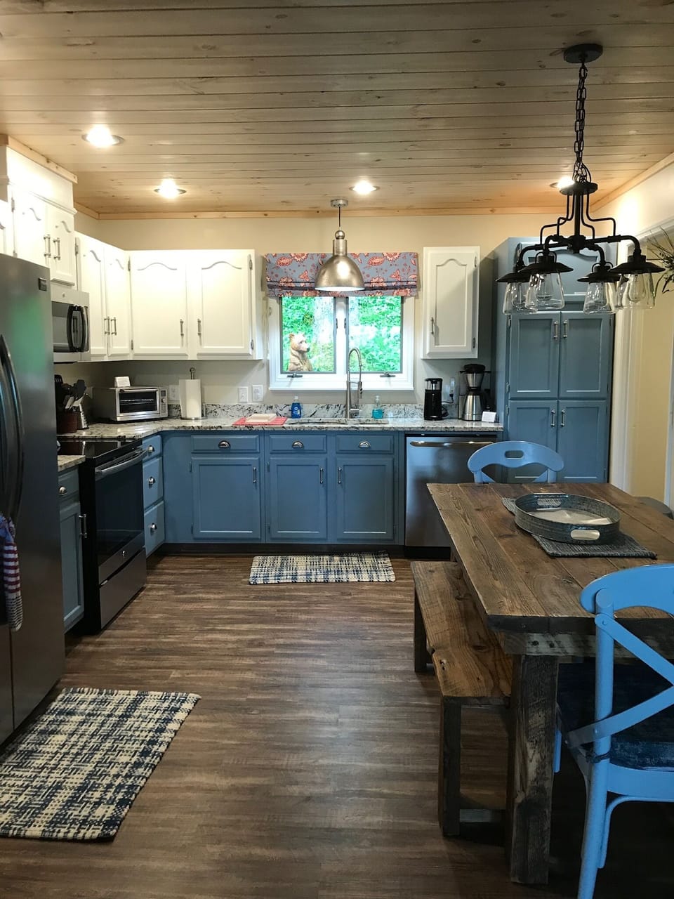 Updated kitchen with stainless appliances and granite countertops. 