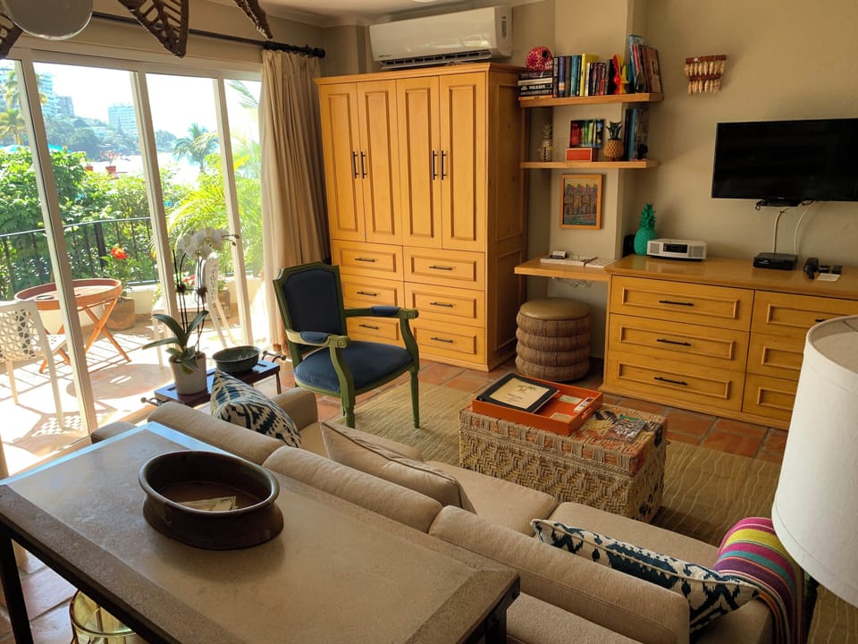Cabinets, sofa bed, and view