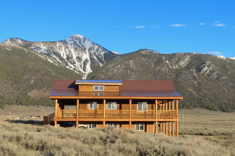 Sheep Mountain towers over the cabin