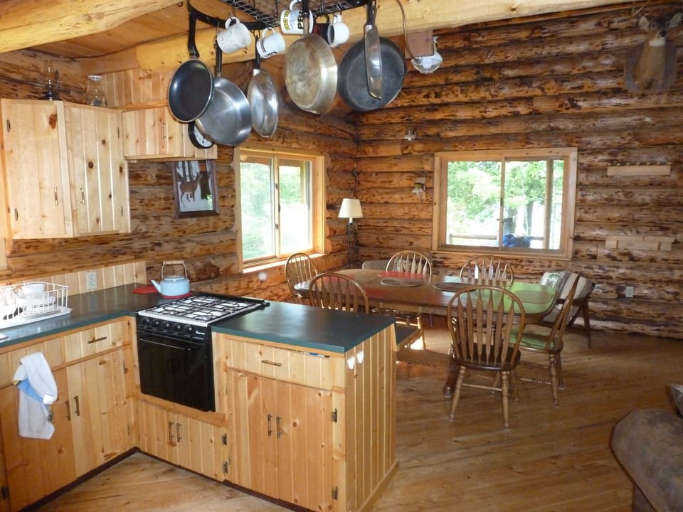 Modern kitchen and dining area.