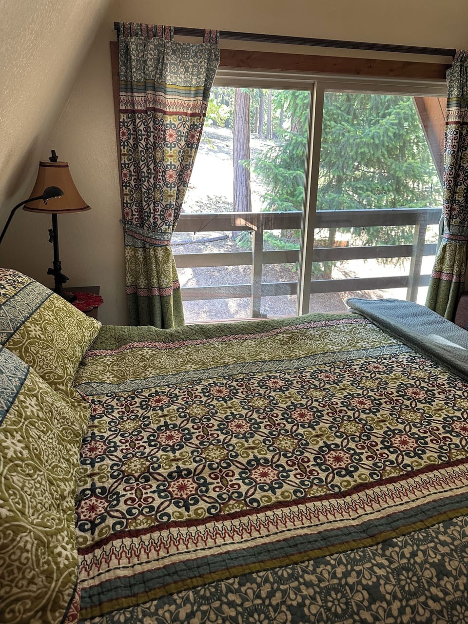 Queen bed either balcony and two children’s sleeping pads