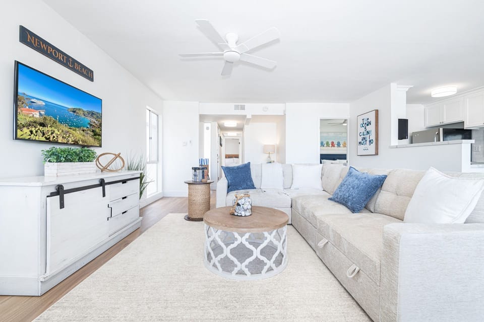 This home's bright interior and stylish beachside motif will sweep you off your feet and straight into vacation mode.
                