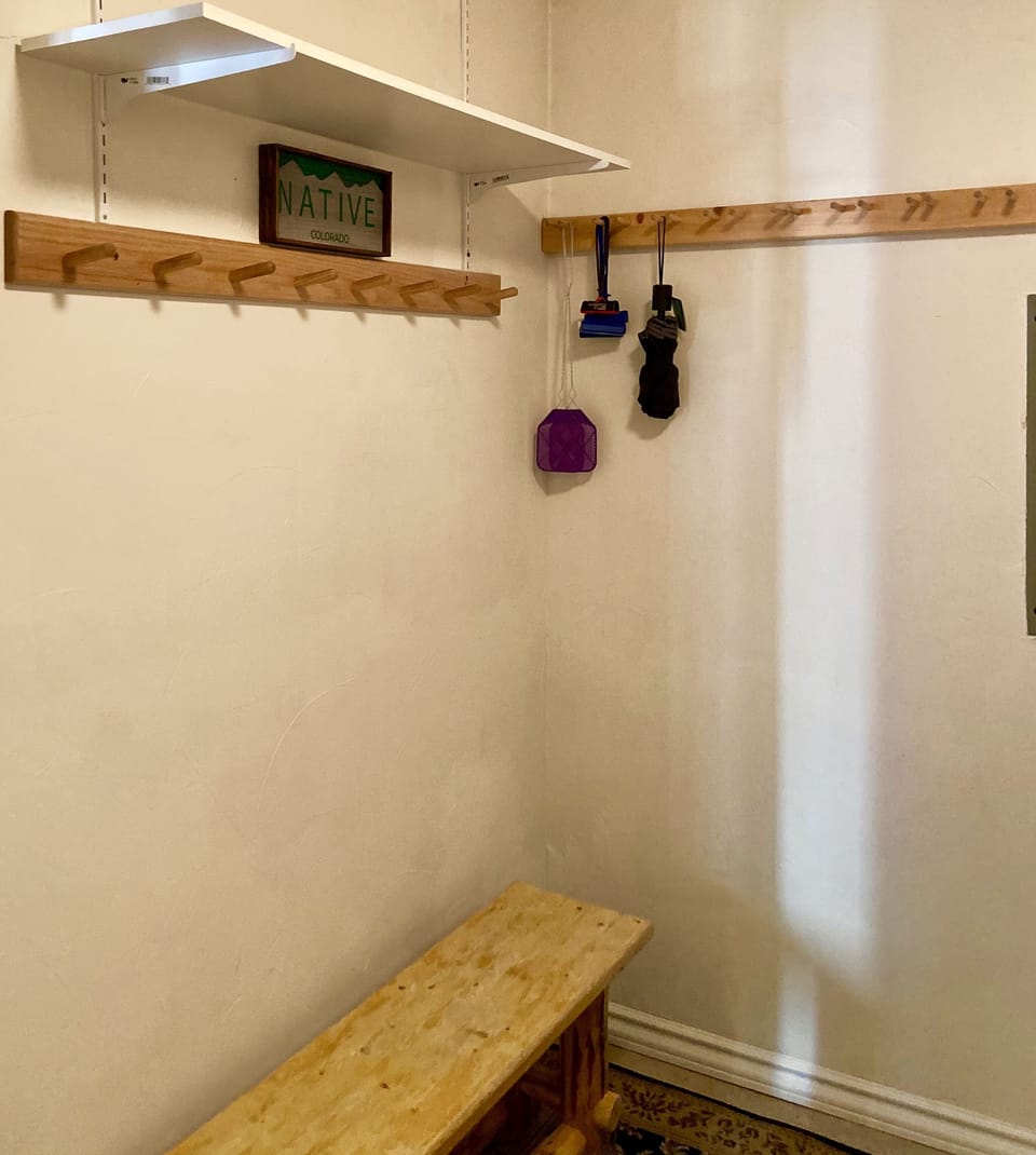 Ski and snowboard racks Laundry room