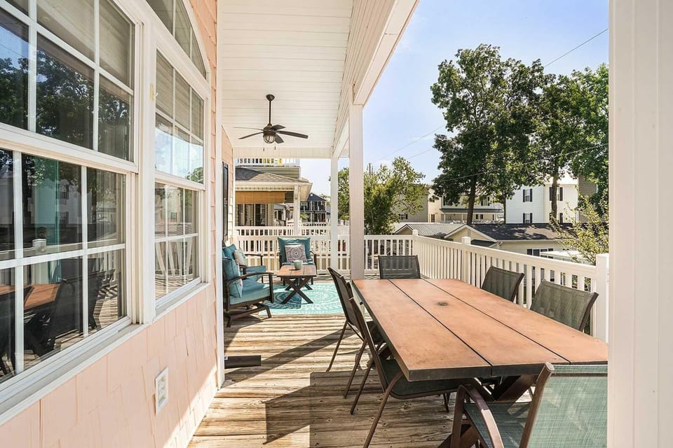 Spacious outdoor deck with dining and lounge seating