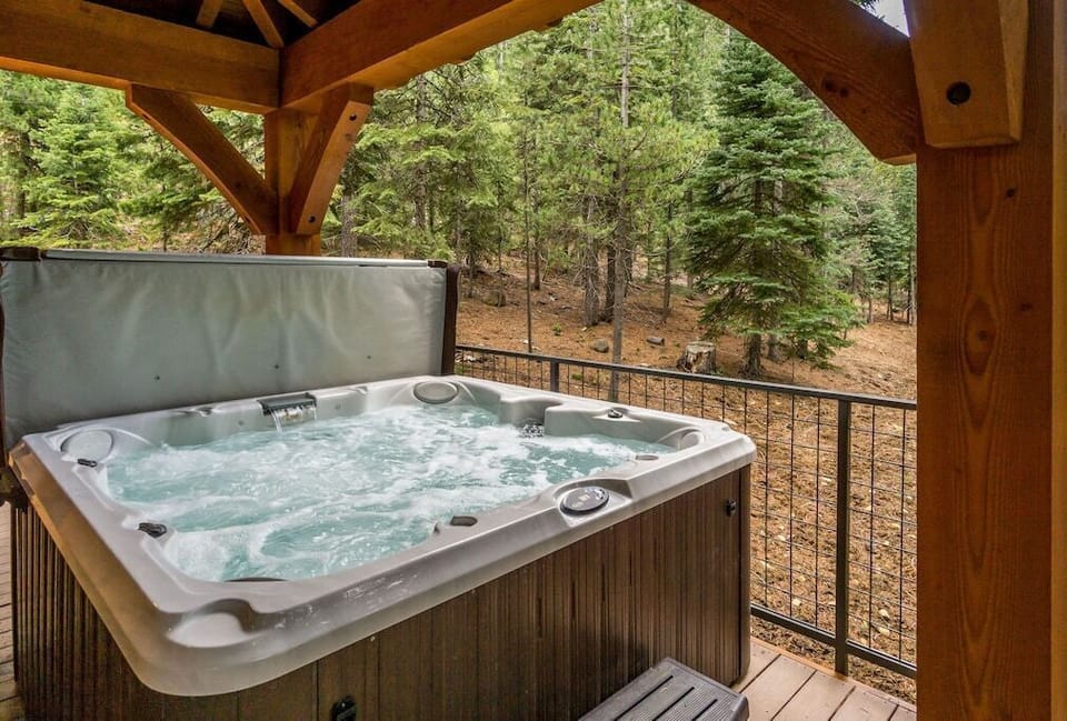 Soak it up in the hot tub with forest and lake views.