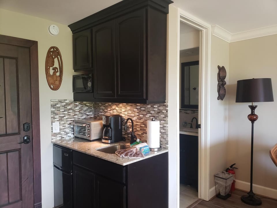 Side B-Kitchenette has minifrig,microwave,coffee maker,toaster, blender, BBQ uts